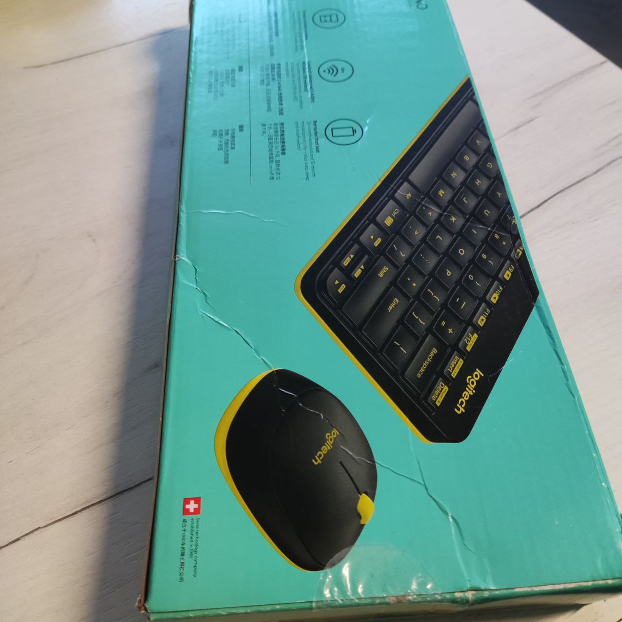 Фото — Клавиатура и мышь Logitech MK240, USB, беспроводной, черный и жёлтый (уценка)
