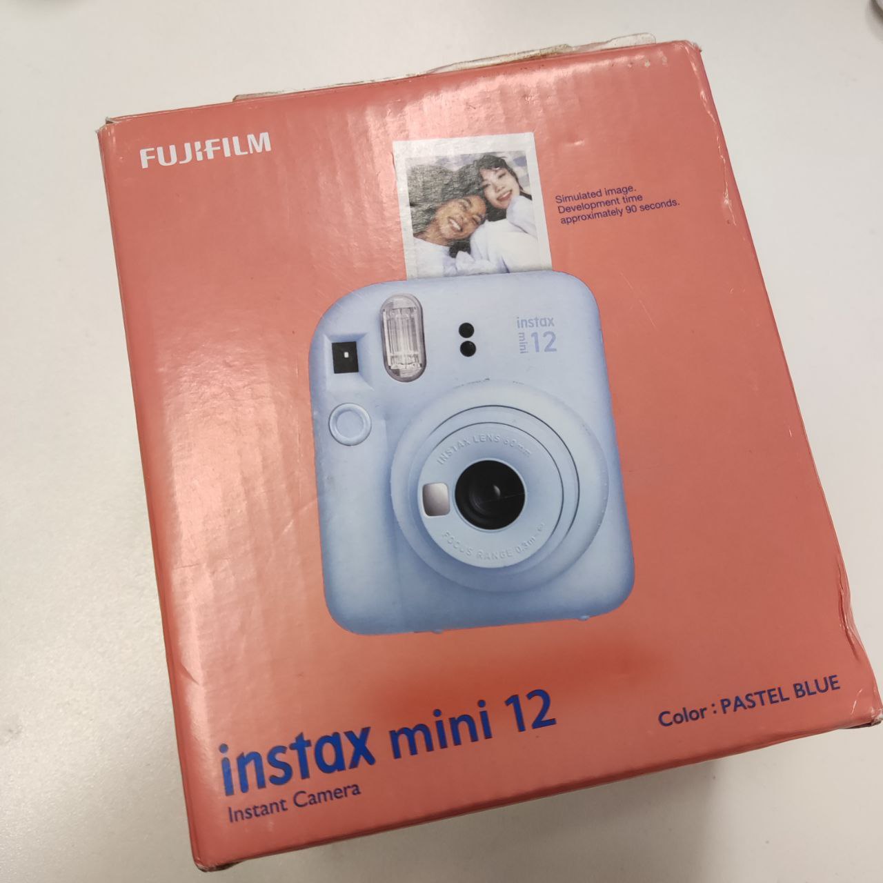 Фото — Фотоаппарат моментальной печати Fujifilm Instax mini 12, синий (уценка)